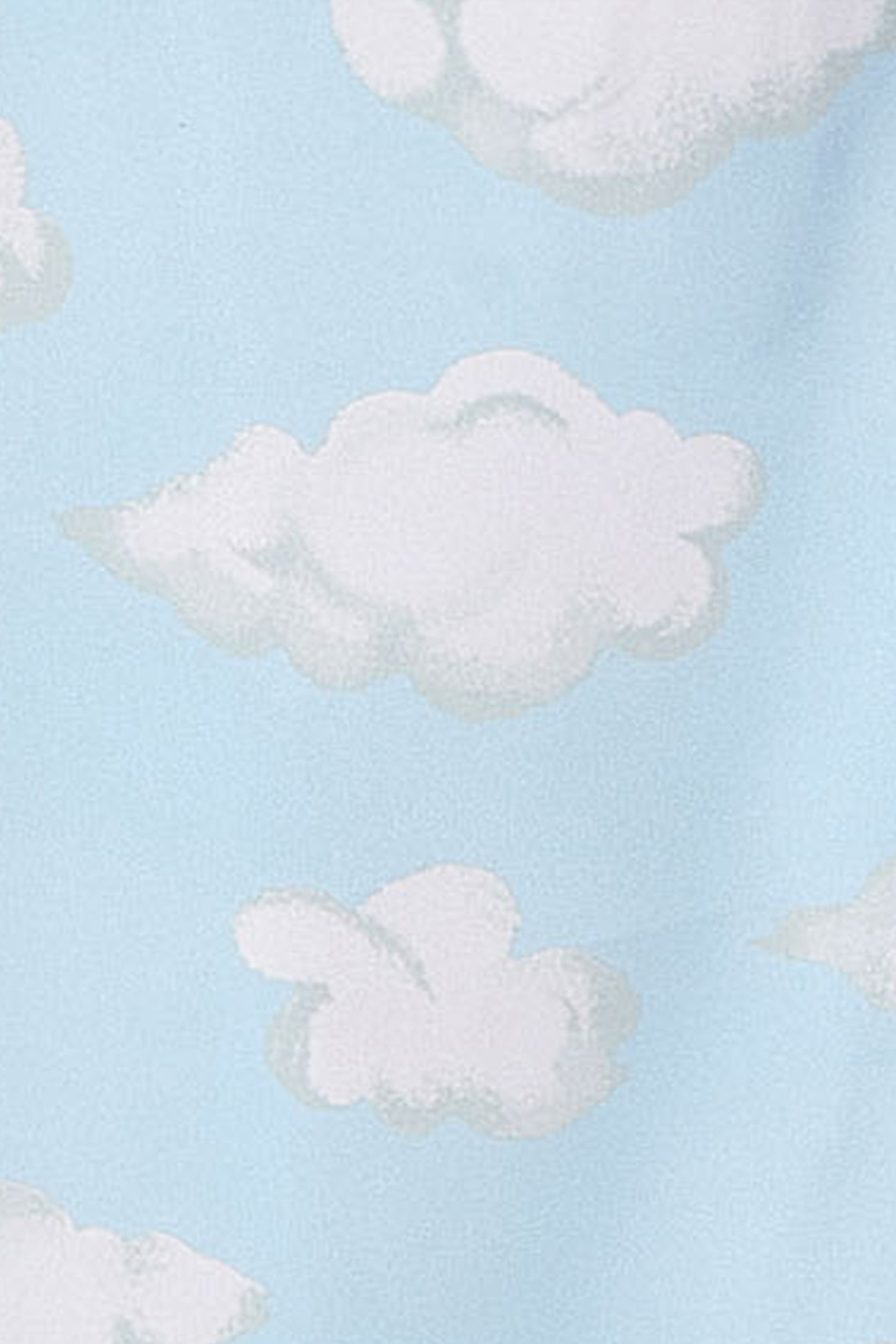 Pattern of iconic Cloud Nine print featuring fluffy white clouds on a light blue background