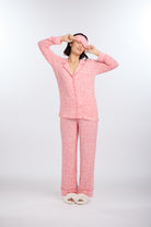 Model in long sleeve Ditsy Blossoms Pajama Set  and matching eye mask by Nick & Nora