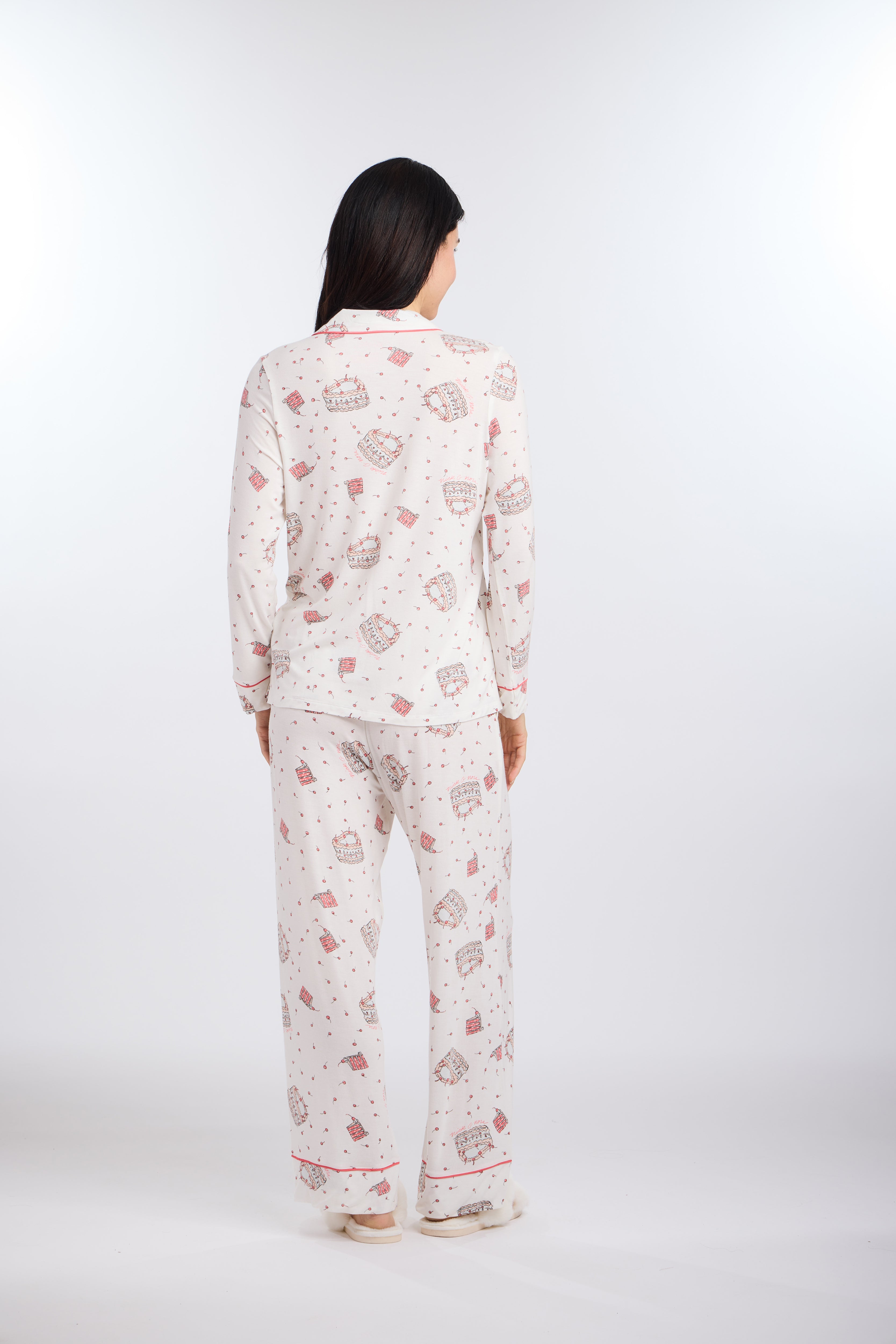 Model facing backwards wearing Let's Eat Cake Long Sleeve Pajama Set by Nick & Nora