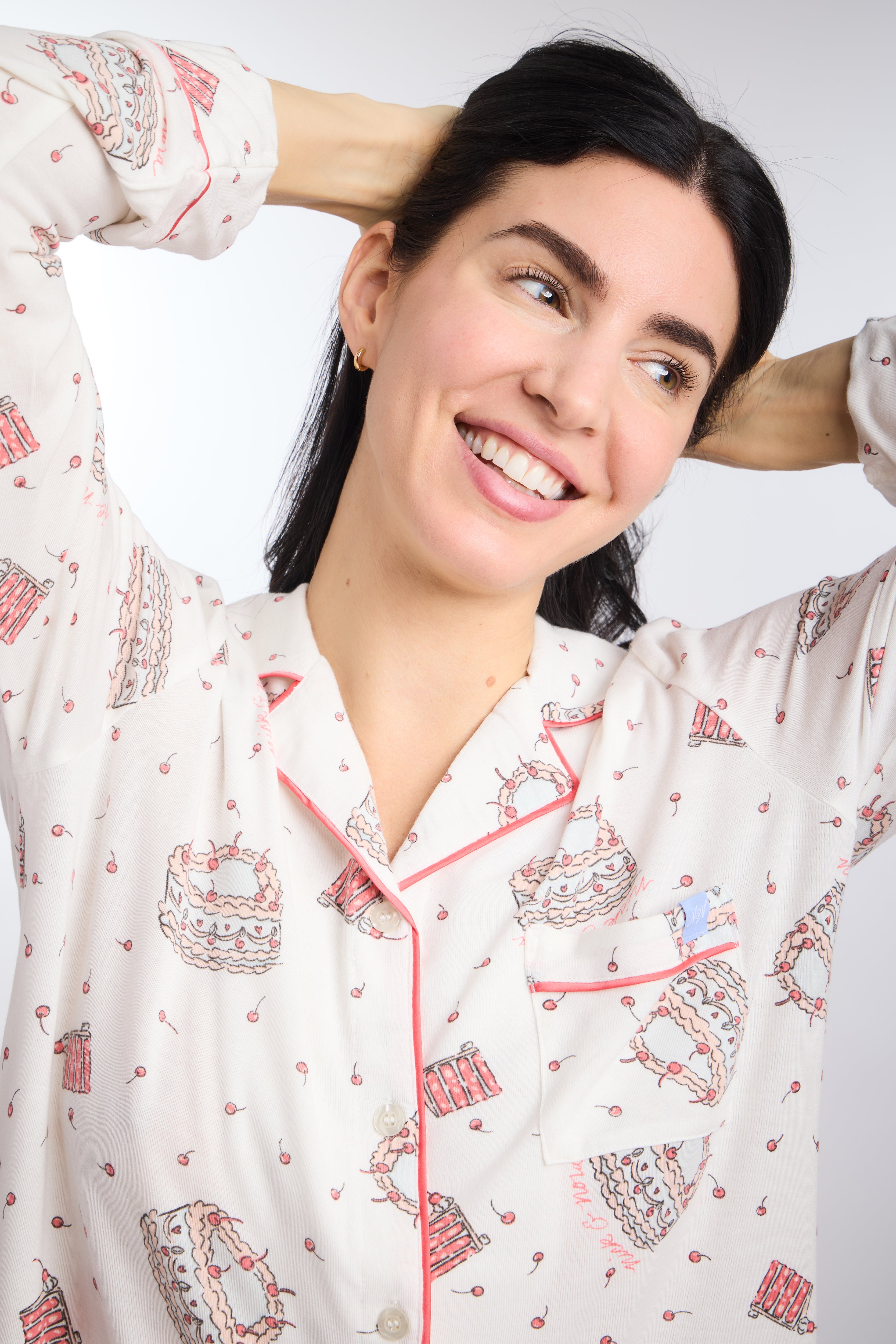 Closeup of Model in Long Sleeve Let's Eat Cake Long Sleeve Pajama Set by Nick & Nora