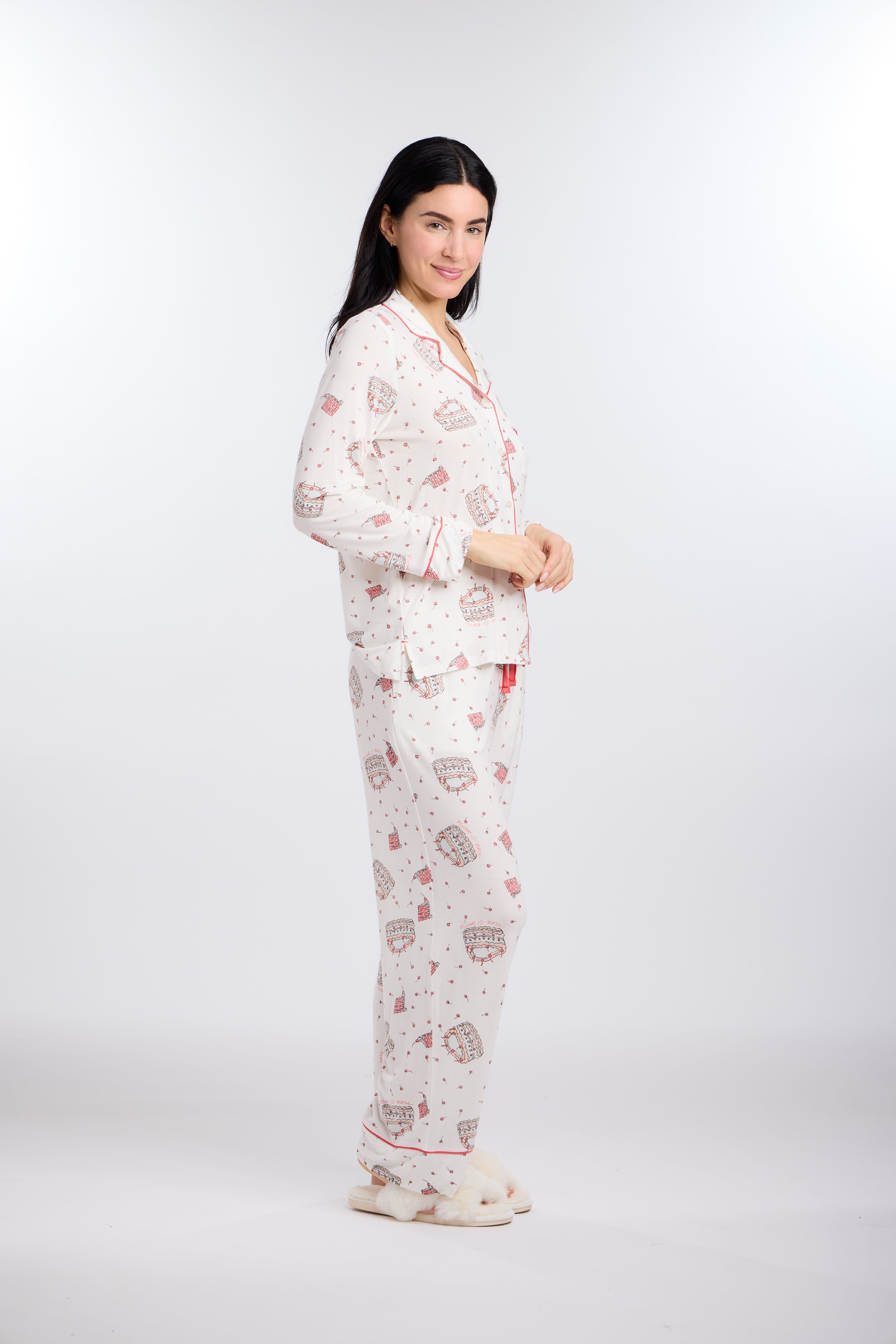Model turned to side wearing Let's Eat Cake Long Sleeve Pajama Set by Nick & Nora