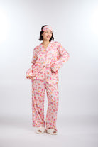 Model in Classic Macarons Long Sleeve Pajama Set with matching eye sleep mask